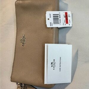 Coach Cream Leather Clutches